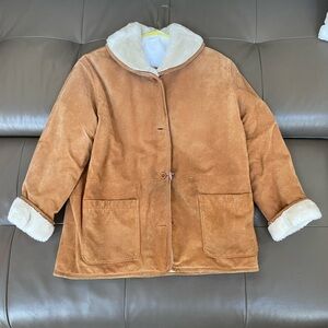 Thick brown jacket with white fur